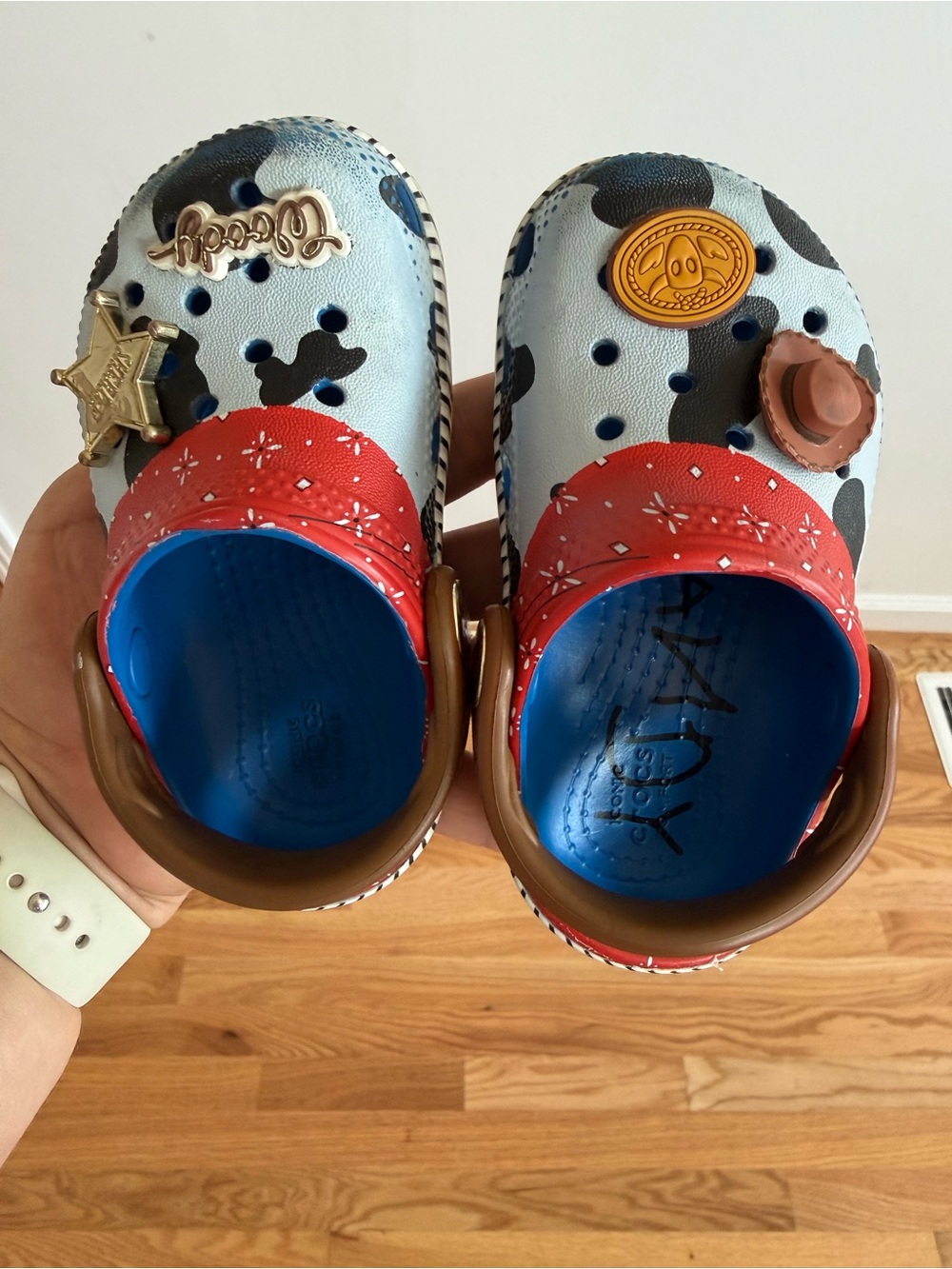 CROCS Kids Light Blue, Red & Brown Cow-Print Clogs with Charms